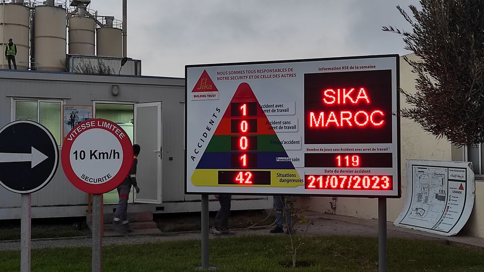 LED safety performance display at a factory entrance