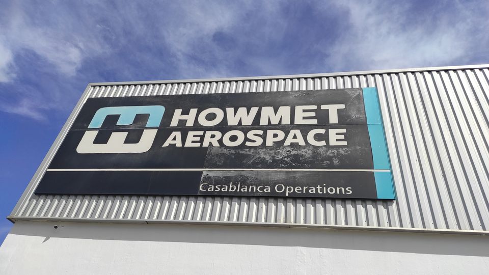 Large-format facade sign on an industrial building